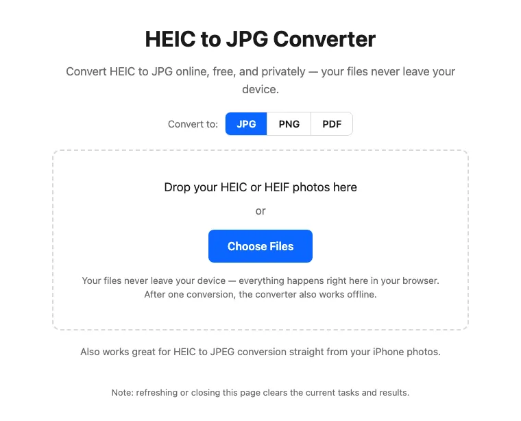 The heicly converter in English before any file is added: a dashed drop box with a Choose Files button